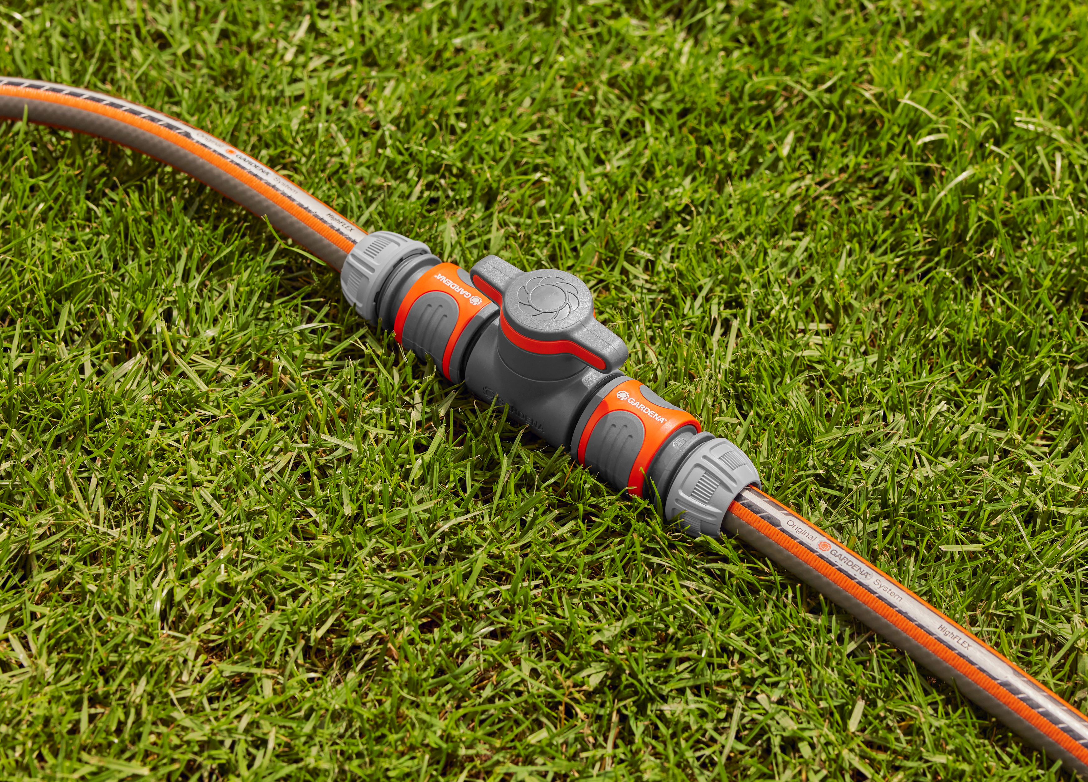 Coupling with Flow-Control Valve