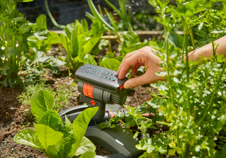 GARDENA AquaZoom 緊湊型擺動灑水器操作示意圖