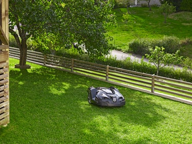 Automower running through a passage